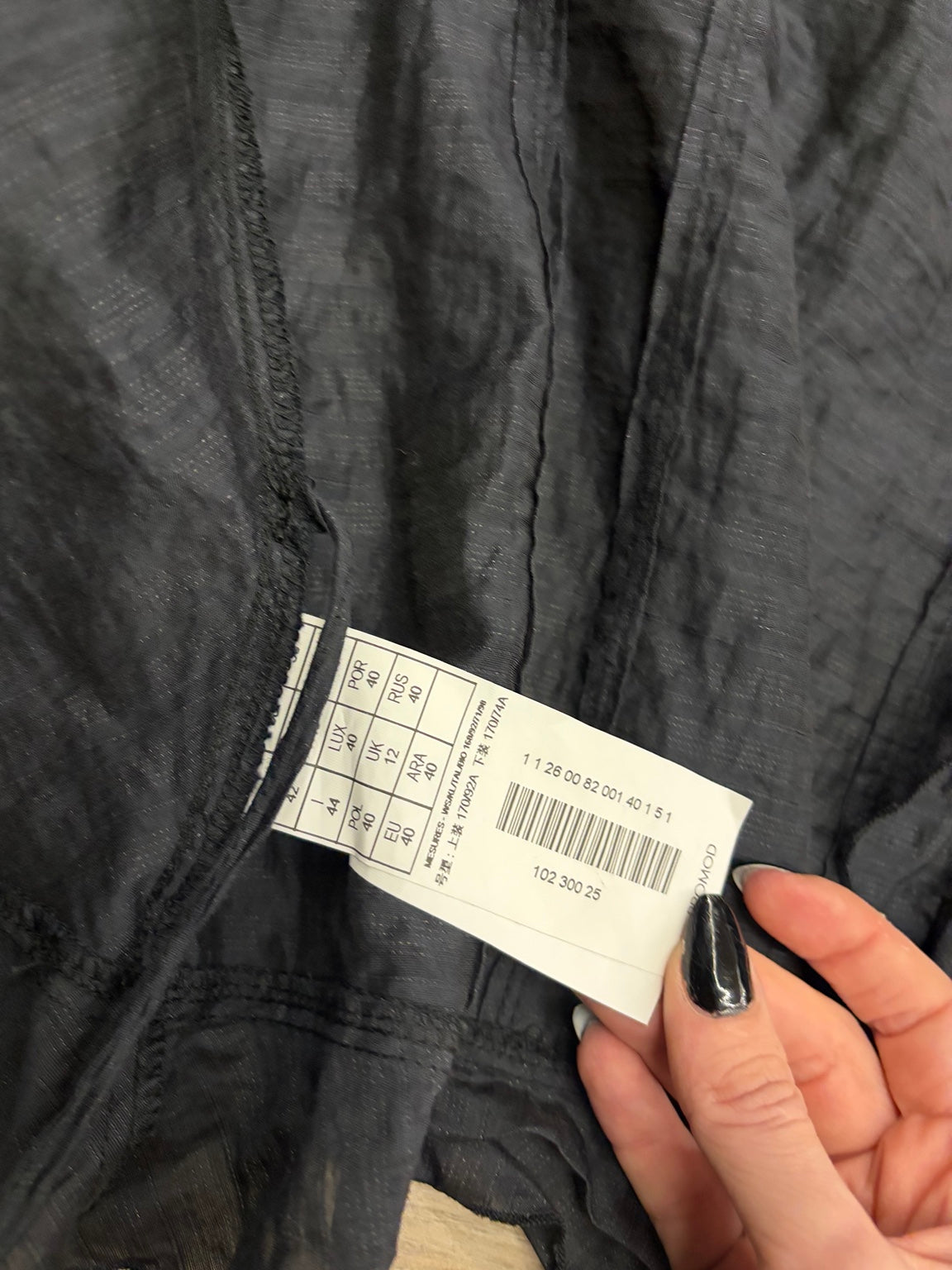 Promod black ruffle wrap blouse care label