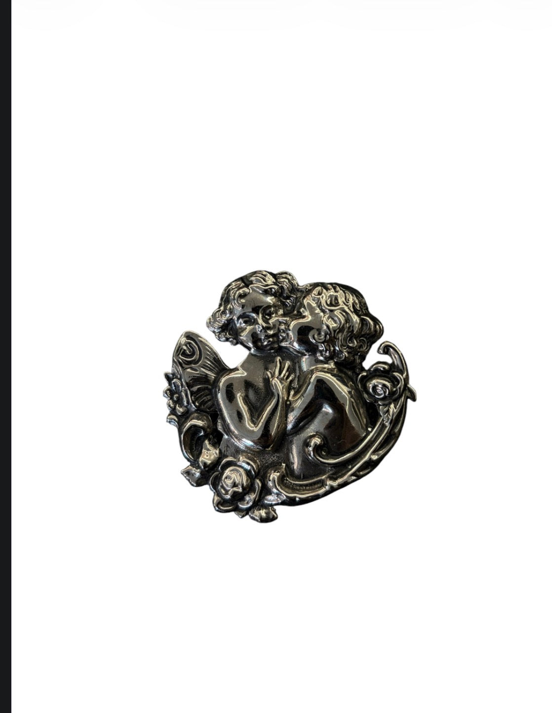 Silver-tone brooch with two cherubs and rose details