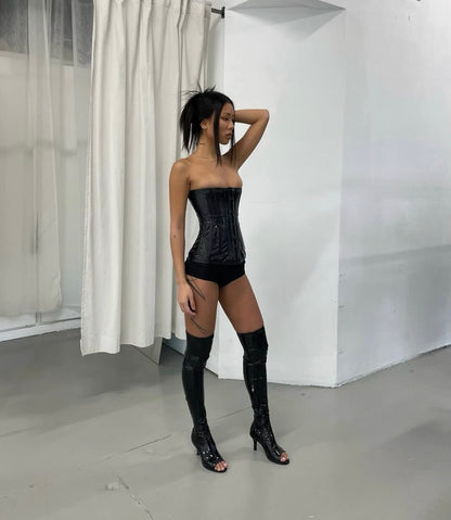 Vollers black patent corset worn in editorial styling